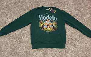 Modelo Cerveza Holiday Cheers Graphic Crewneck Fleece Sweatshirt